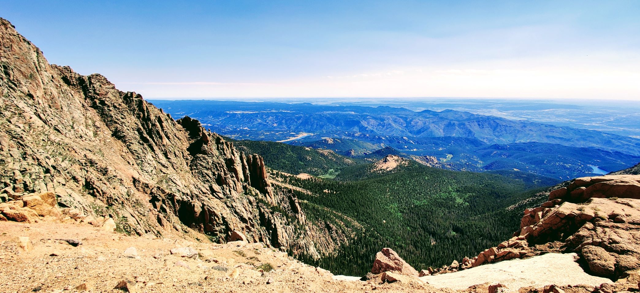 sheer rock face leads into a mountainous valley near Colorado Springs, Colorado
