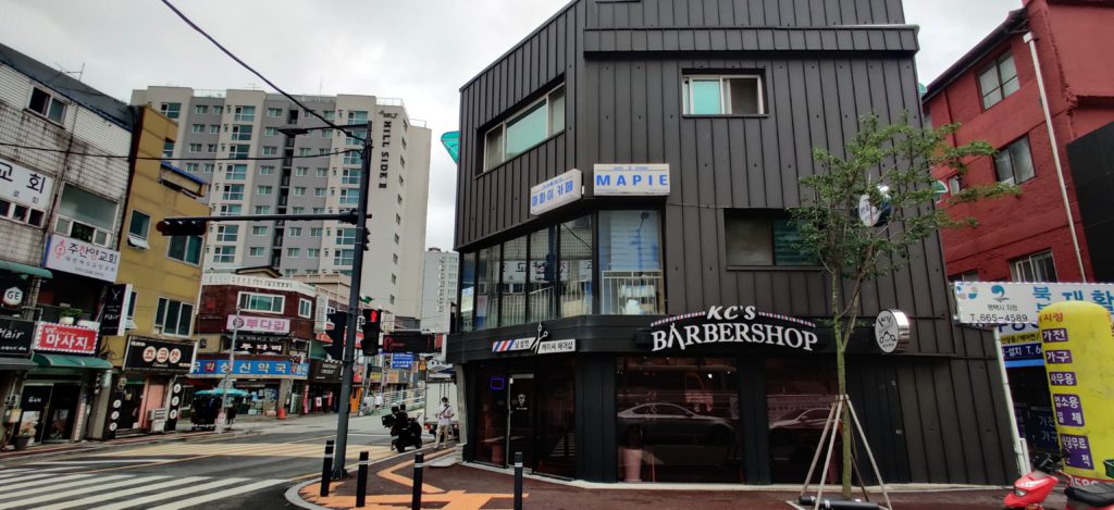 A korean barber shop on the corner in Pyongtaek Korea

