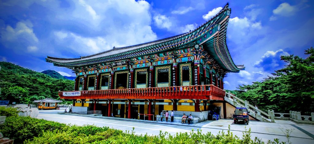 a larger-than-life buddhist structure in south korea covered in color Donghwasa Daegu