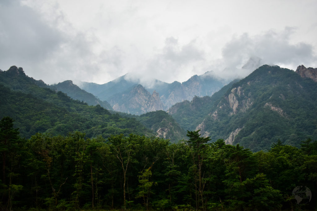 A mountain range covered in mist and clouds in South Korea