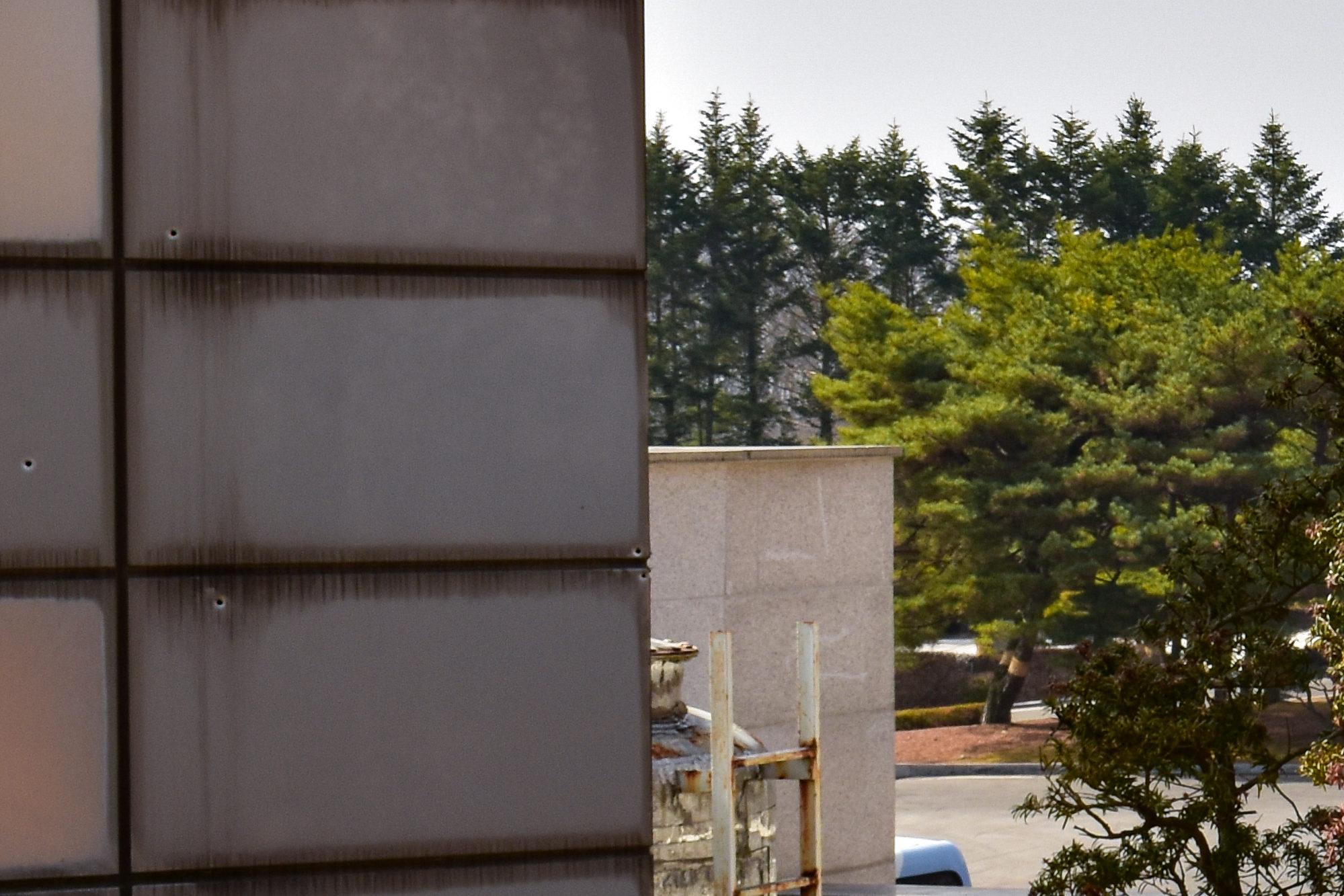 Bullet holes in one of the structures inside the JSA