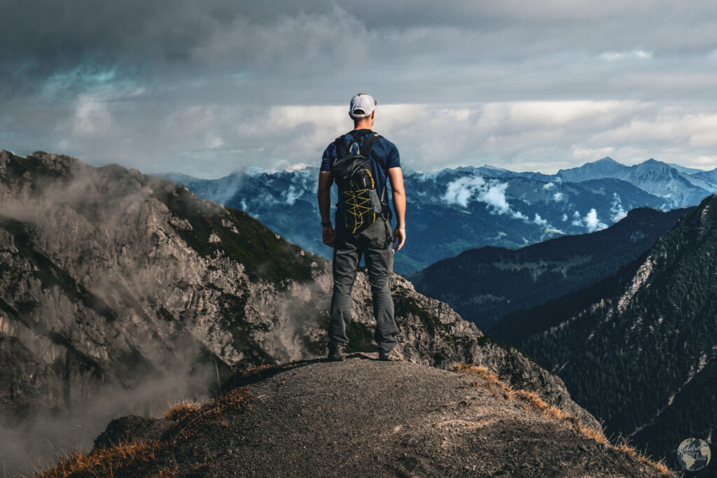 me, standing on the border of Germany and Austria looking over the alps