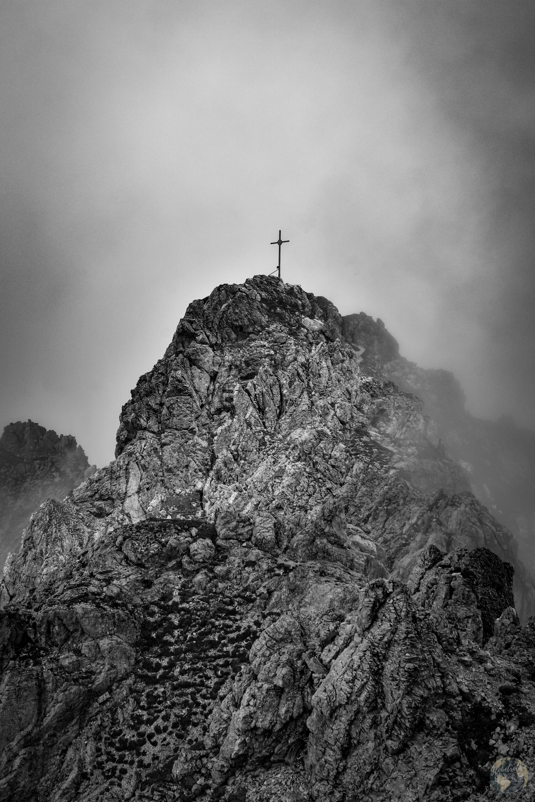 A cross on top of a mountain found by hiking in germany