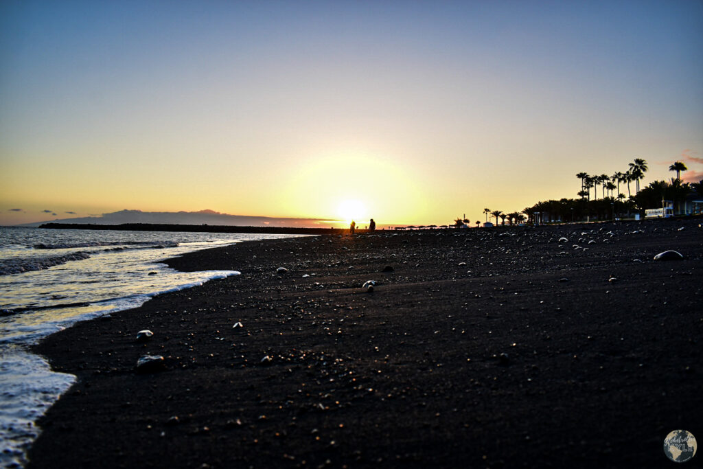 A sunset over a beach, one of the many what to do in Tenerife items