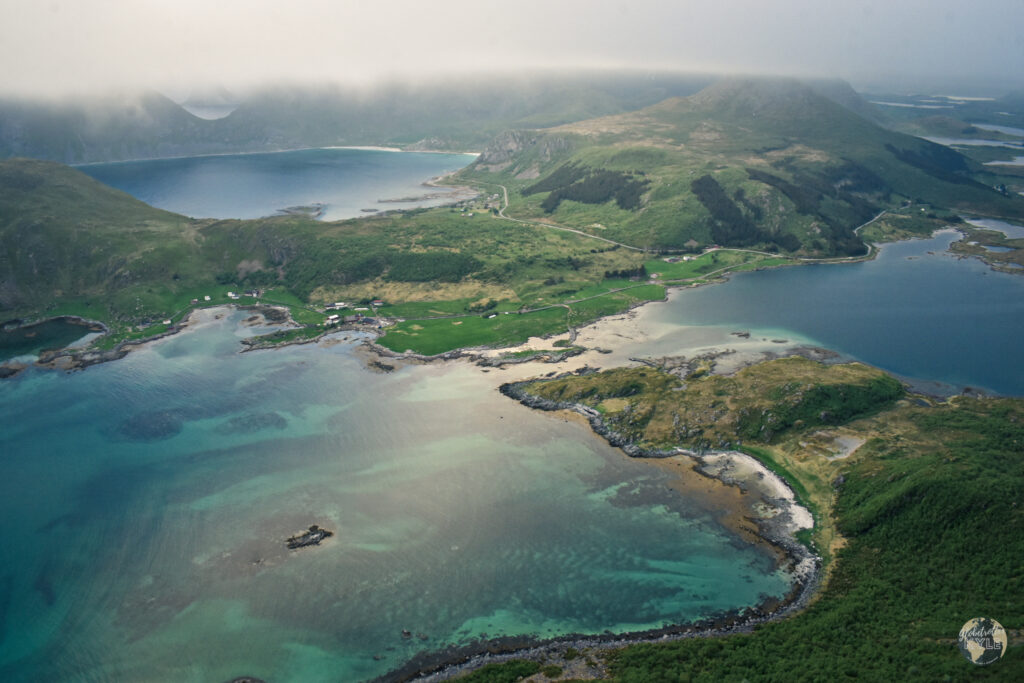 Land masses and mountains in the ocean seen from Offersøykammen while hiking the Lofoten Islands