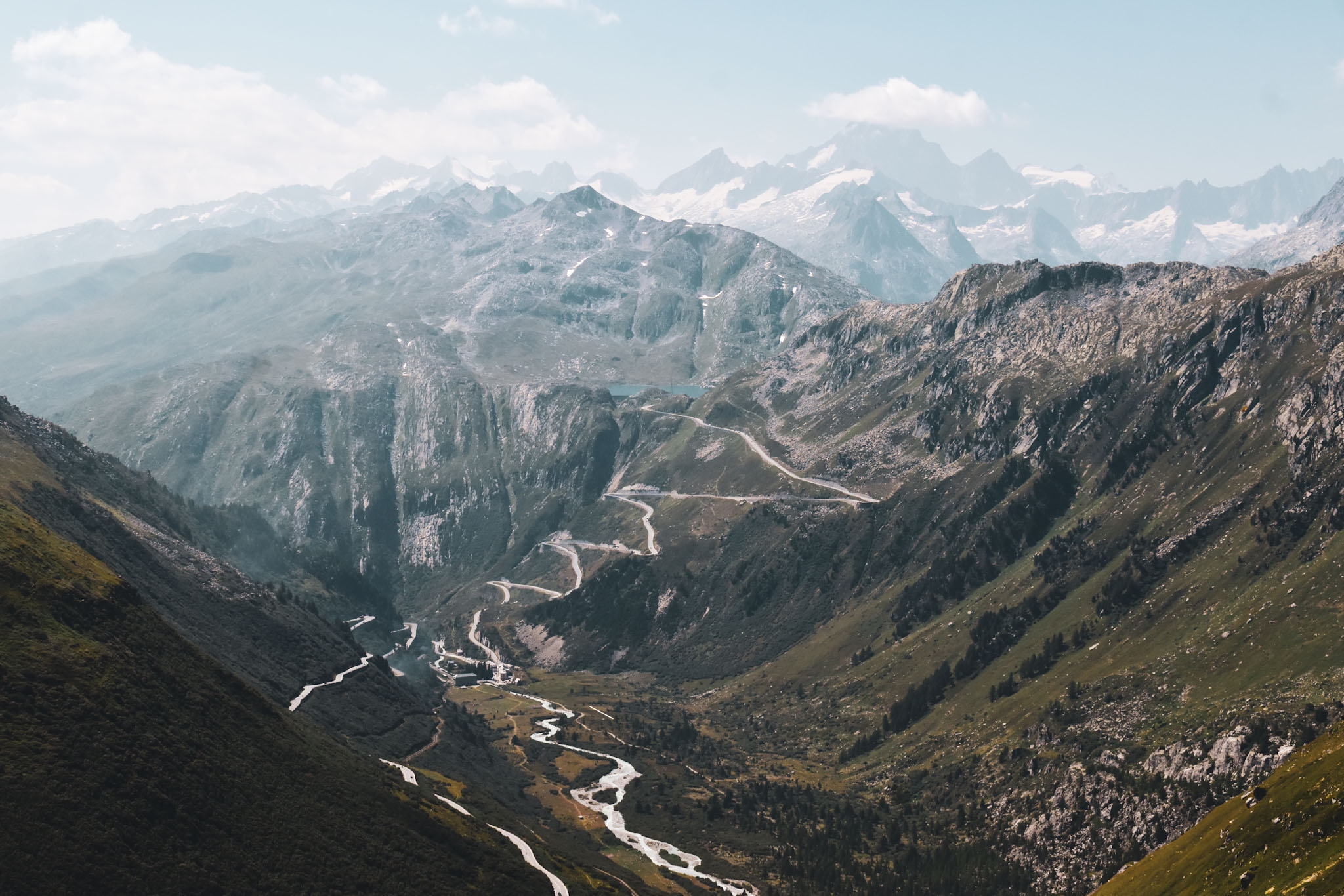 winding roads through the swiss alps for motorcycle rides