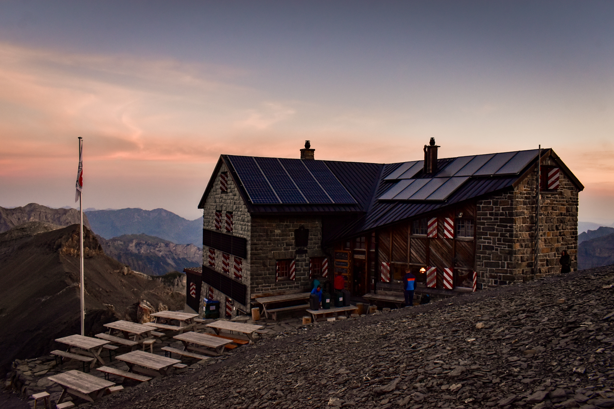 the Blüemlisalphütte in switzerland, a place to stay when doing a hut to hut hike in Switzerland