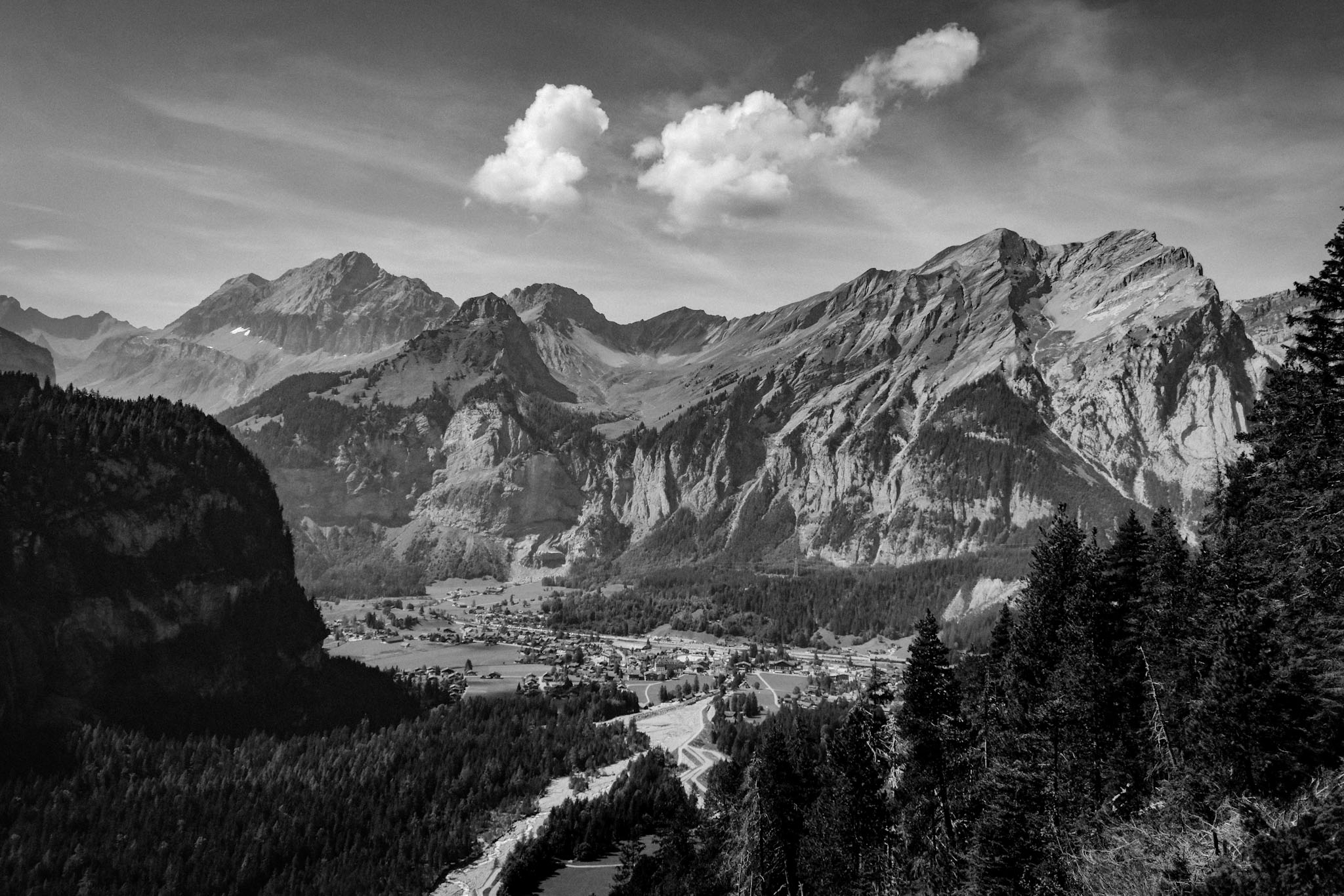 a black and white landscape photo of the swiss alps in the Jungfrau Region of Switzerland