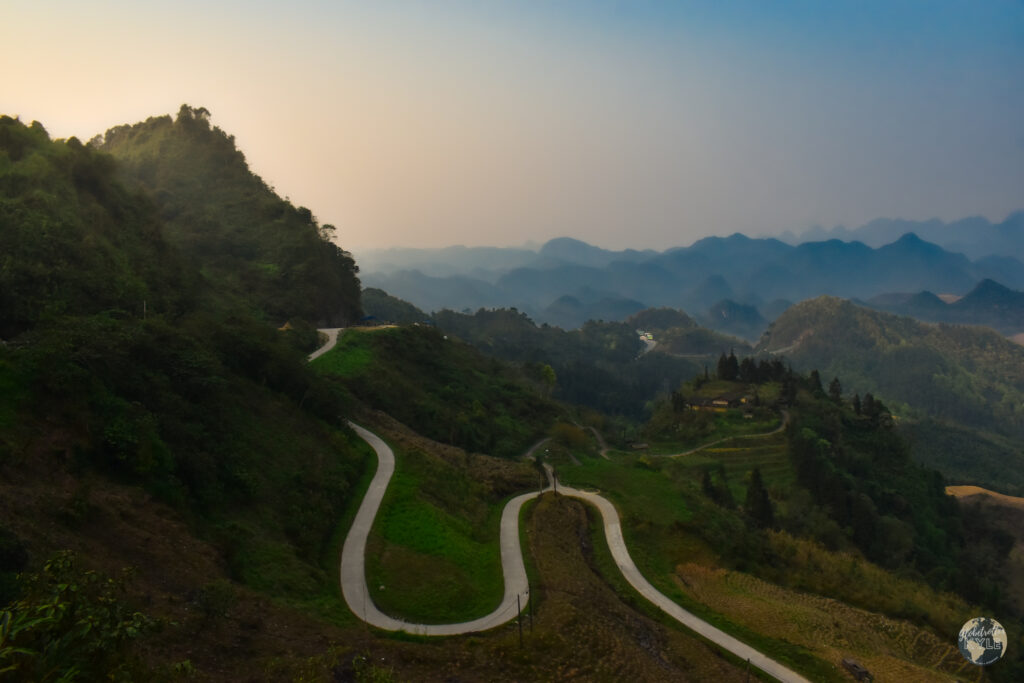 a winding road through the Ha Giang Mountains ha giang loop
