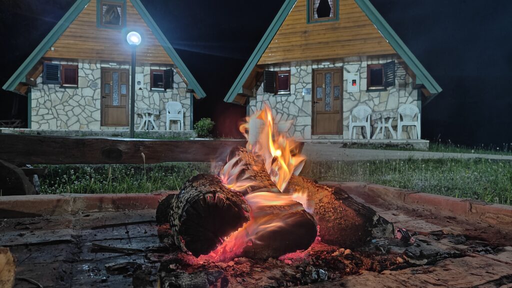 a campfire at Durmitorski Bungalovi near Durmitor National Park in Montenegro